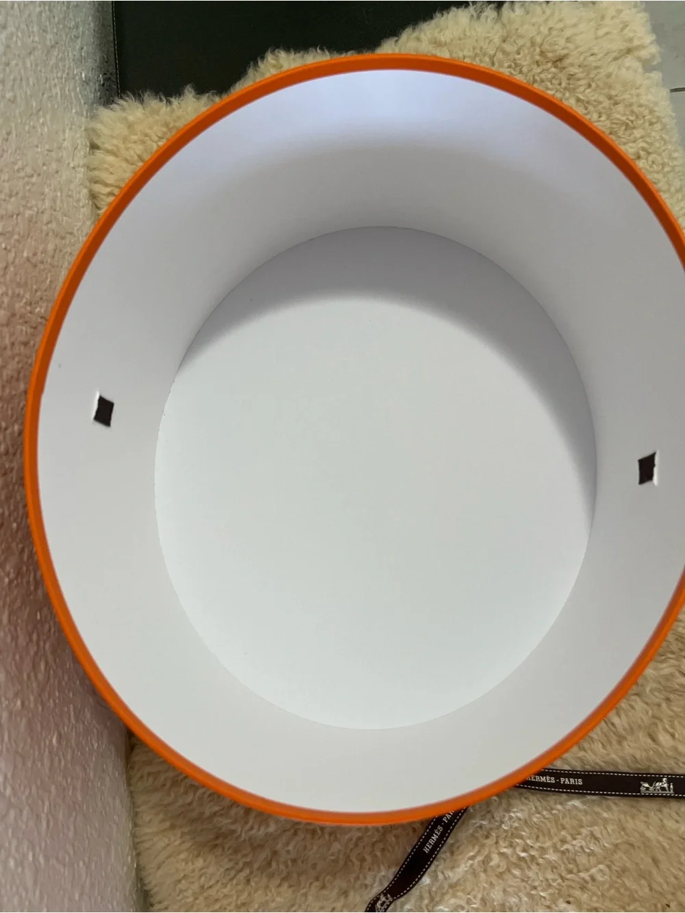 Original Hermès Orange Round Hat Box with branded brown ribbon
